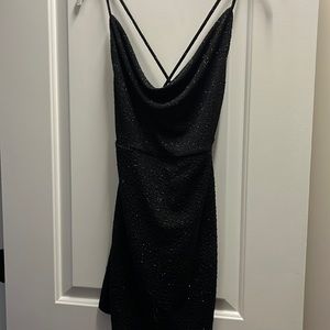 Wore once to homecoming, flattering sparkly scoop neck with strappy back!